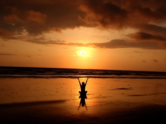 A woman on the beach, represents wellbeing