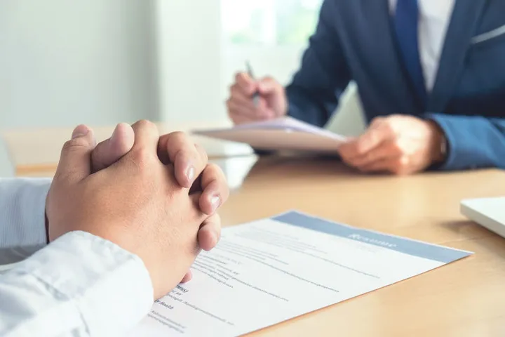 A healthcare provider being interviewed for a job