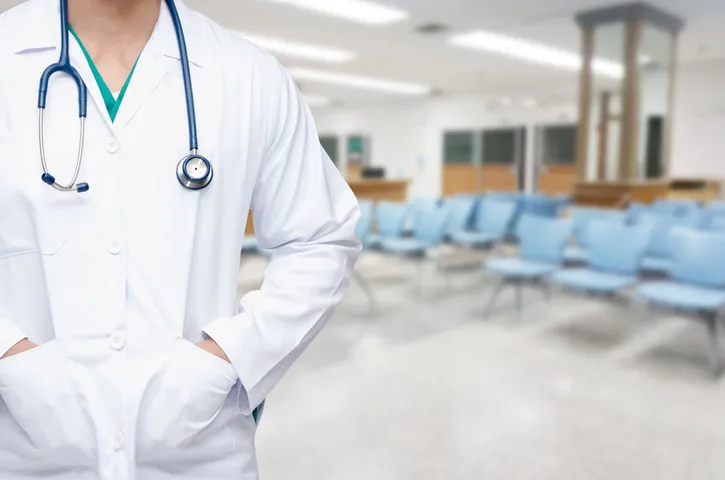 A hospital employed physician at work