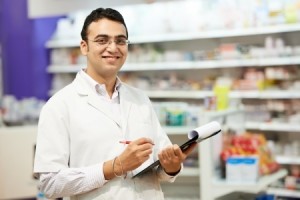 Cheerful pharmacist in retail store
