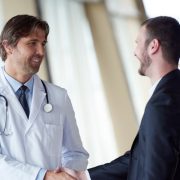 doctor shaking hands with a prospective candidate